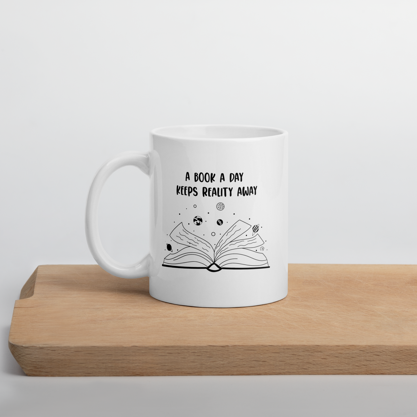 A Book a Day Keeps Reality Away White Mug